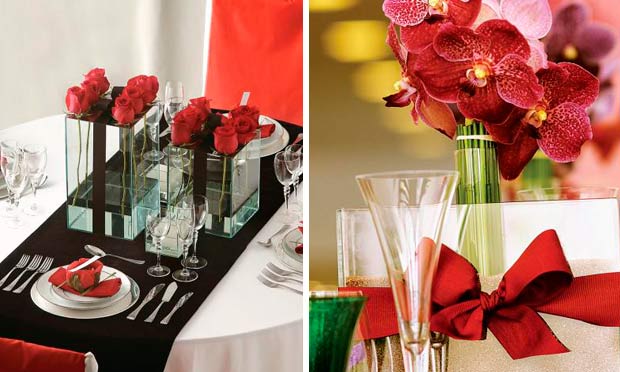 Mesa com toalha preta e rosas vermelhas e vaso de vidro com laço vermelho