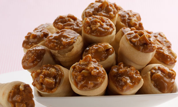 Canudinhos de doce de leite e amendoim Canudinhos de doce de leite e amendoim