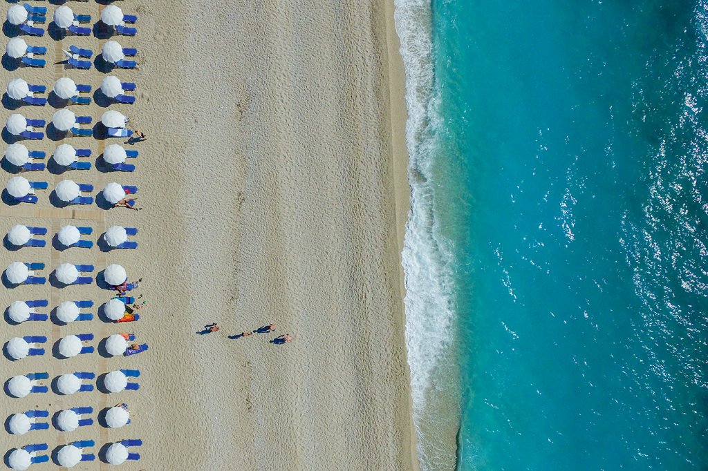 LEFKADA, GREECE - JUNE 08: Aerial view of umbrelas and people who enjoy the Kathisma beach on June 08, 2016 in Lefkada,Greece. (Photo by Athanasios Gioumpasis/Getty Images)