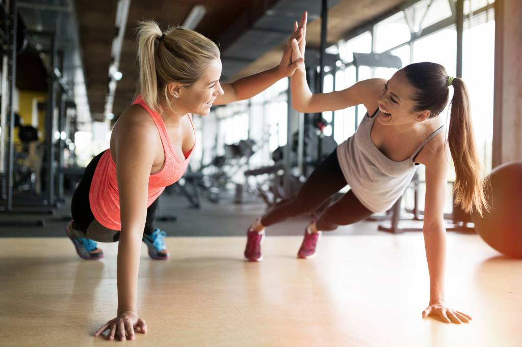 Beautiful women working out in gym Beautiful women working out in gym