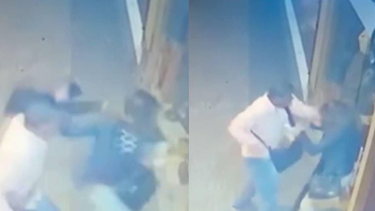 Homem agredindo mulher em calçada