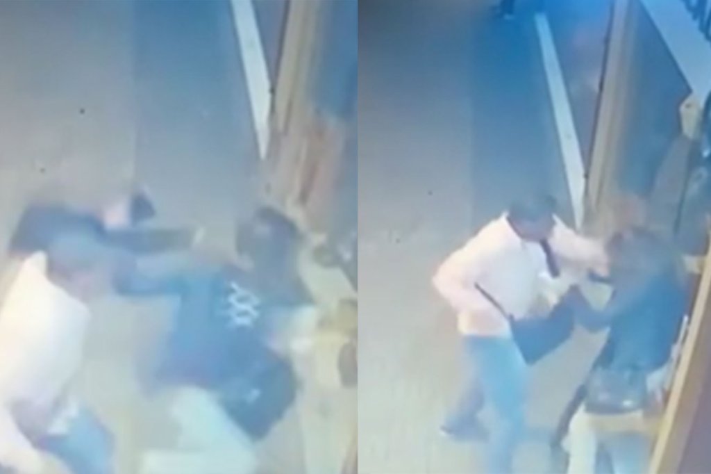 Homem agredindo mulher em calçada
