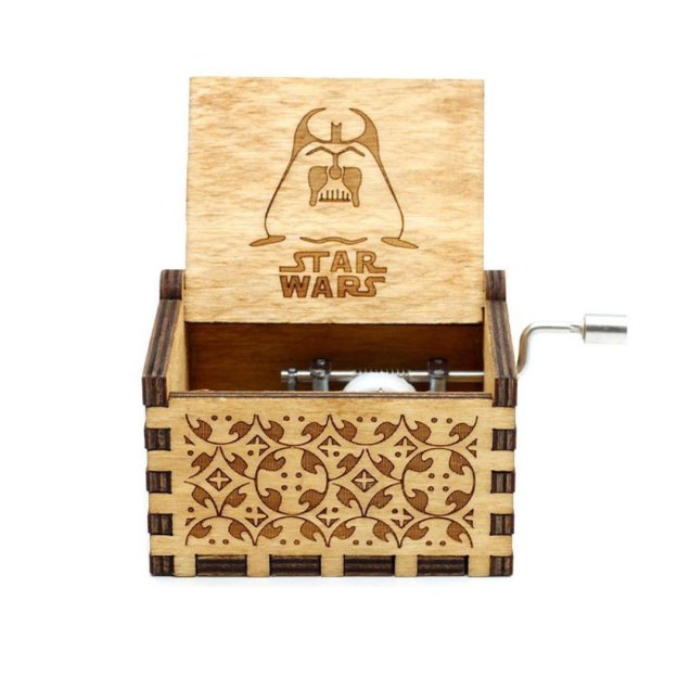 Caixa de música Star Wars, de madeira (5 x 6 x 4 cm). <a href="https://www.toyshow.com.br/colecionaveis/action-figures/caixa-de-musica-star-wars" target="_blank" rel="noopener">ToyShow</a>, R$ 99,90
