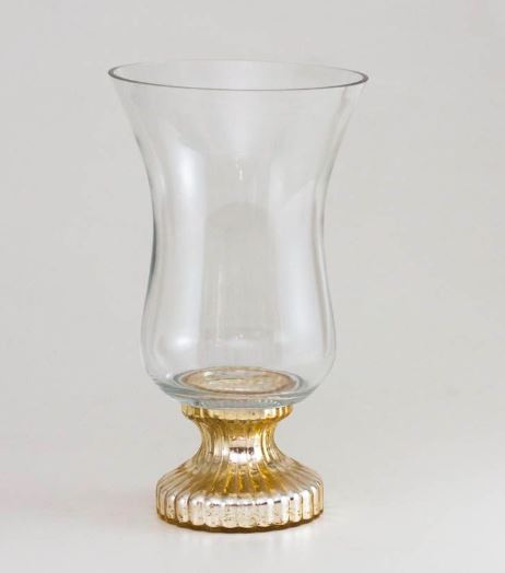 O modelo tulipa é de vidro e tem altura de 32 cm. <a href="https://www.marmelodecor.com.br/castical-tulipa-alto-em-vidro" target="_blank" rel="noopener">Marmelo</a>, R$ 159,90 O modelo tulipa é de vidro e tem altura de 32 cm. <a href="https://www.marmelodecor.com.br/castical-tulipa-alto-em-vidro" target="_blank" rel="noopener">Marmelo</a>, R$ 159,90