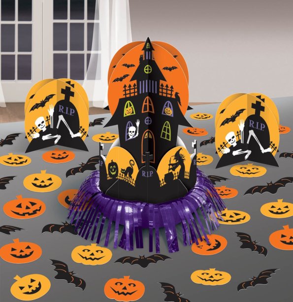 Kit de enfeites de mesa de cartonado e laminado (uma peça de 31,75 cm, duas de 15,24 cm e 24 confetes de 5 cm). <a href="http://www.partycity.com.br/halloween-decoracao/kit-enfeite-de-mesa-halloween.html" target="_blank" rel="noopener">Party City</a>, R$ 40,20