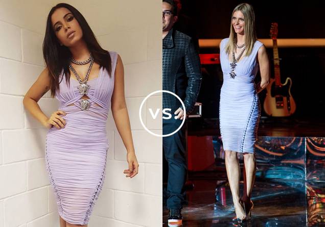 <strong>Anitta</strong> e <strong>Fernanda Lima</strong> vestem<strong> Versace</strong>. O vestido lilás de shape ajustado ao corpo e detalhe de correntes foi usado pela cantora no<em> Caldeirão de Ouro</em>. Já a apresentadora desfilou o modelo durante a 1ª temporada do <em>Superstar</em>. Minimalista, o cabelo solto e chapado foi eleito por ambas. <strong>Anitta</strong> e <strong>Fernanda Lima</strong> vestem<strong> Versace</strong>. O vestido lilás de shape ajustado ao corpo e detalhe de correntes foi usado pela cantora no<em> Caldeirão de Ouro</em>. Já a apresentadora desfilou o modelo durante a 1ª temporada do <em>Superstar</em>. Minimalista, o cabelo solto e chapado foi eleito por ambas.