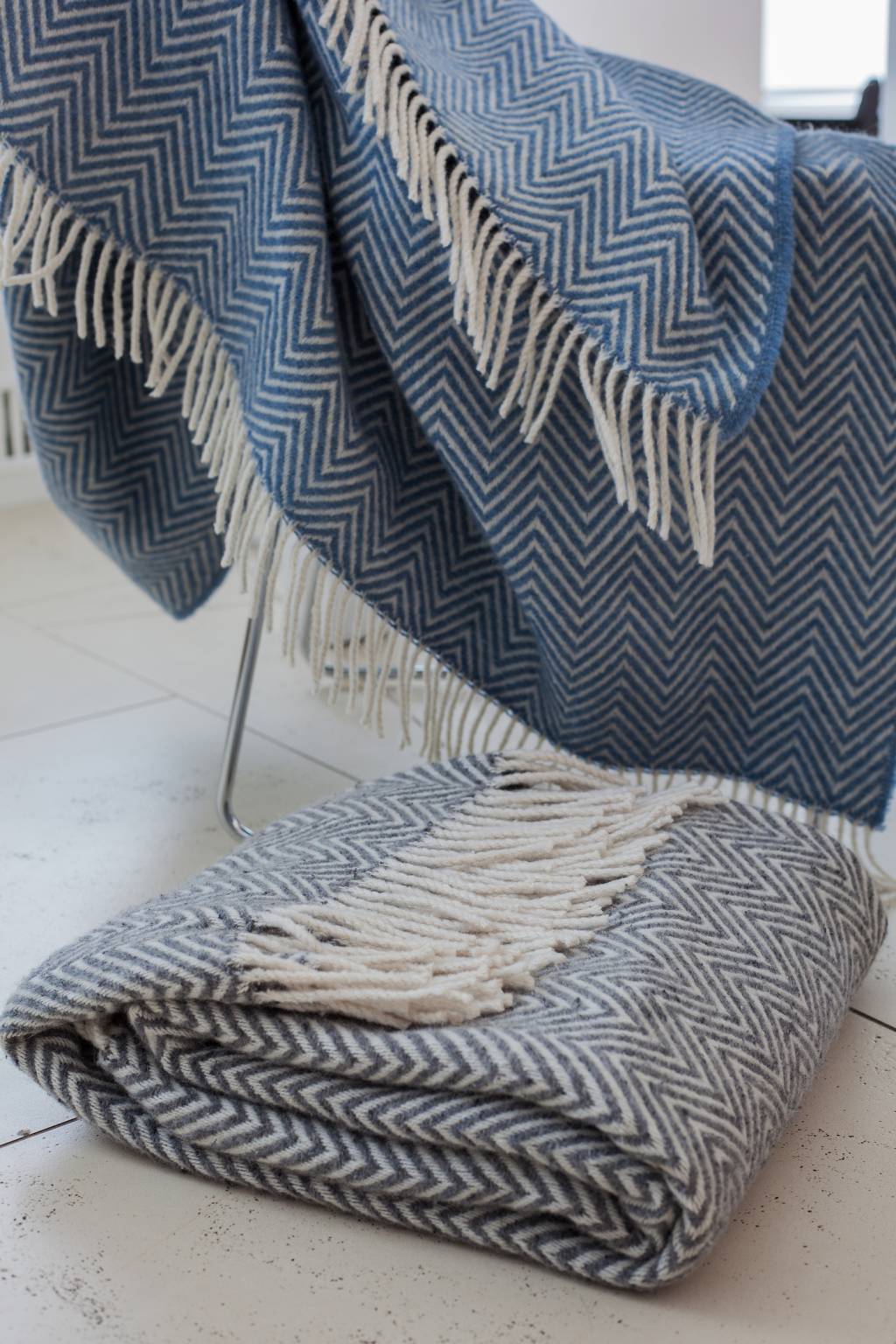 Plaid hanging on a chair and lay the floor