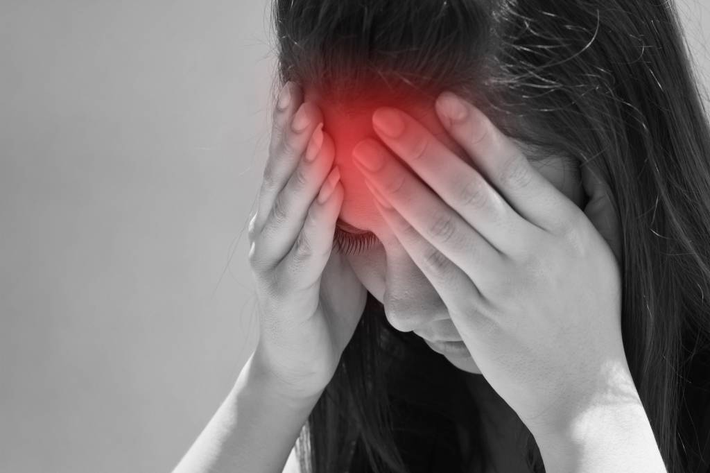 woman with serious headache, migraine, stress, hangover