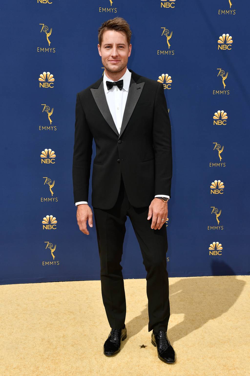 Justin Hartley attends the 70th Emmy Awards Justin Hartley attends the 70th Emmy Awards