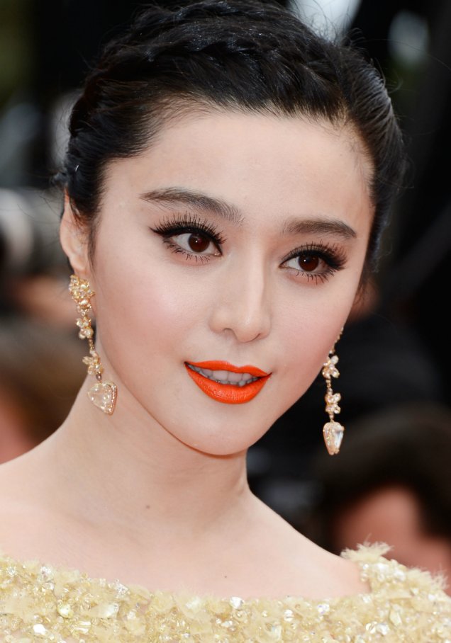 <strong>Fan Bingbing:</strong> a atriz chinesa sabe das coisas e sempre aposta no batom laranja vivo para contrastar com sua pele branquinha.