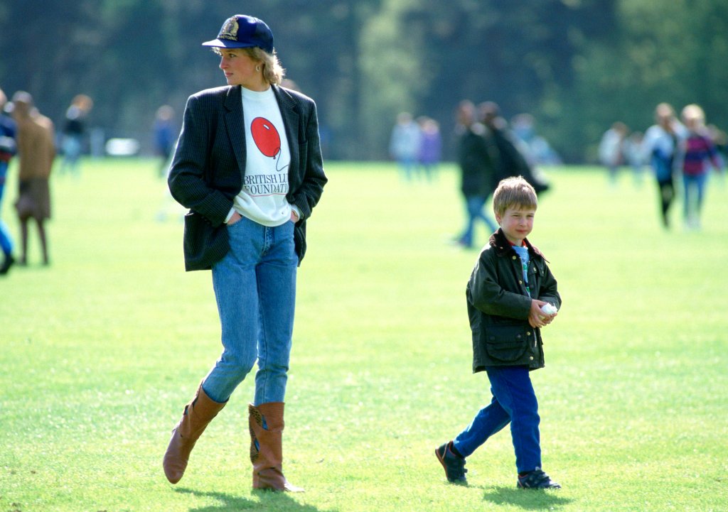 WINDSOR, UNITED KINGDOM - MAY 02: Prince William With His Mother, Diana, Princess Of Wales At Guards Polo Club. The Princess Is Casually Dressed In A Sweatshirt With The British Lung Foundation Logo On The Front Of Her T-shirt. (Photo by Tim Graham/Getty Images)