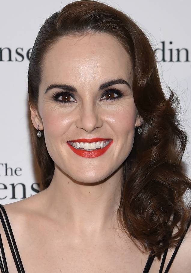 <strong>Michelle Dockery:</strong> começando a se aventurar no mundo do batom laranja? Comece pelas nuances mais escuras, como o telha, e capriche no lápis preto. <strong>Michelle Dockery:</strong> começando a se aventurar no mundo do batom laranja? Comece pelas nuances mais escuras, como o telha, e capriche no lápis preto.