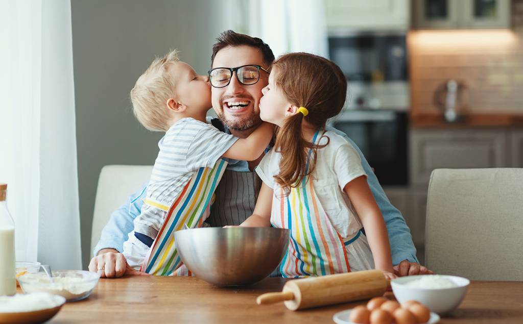 father with children   baking cookies