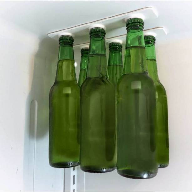 Ímã Segura Cerva. Tira de metal imantado (28 cm de comprimento), com verso adesivado para grudar na prateleira de cima da geladeira. Trekos&Cacarekos, R$ 46,34.