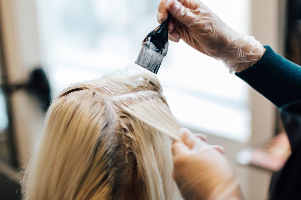 Clients hair being lightened at hairdresser in Sweden Clients hair being lightened at hairdresser in Sweden
