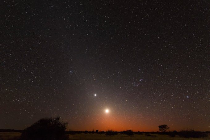 Namibia, Region Khomas, near Uhlenhorst, Astrophoto, RIsing moon and Planet Venus embedded in glowing Zodiacal Light during dawn, constellation Orion upside down