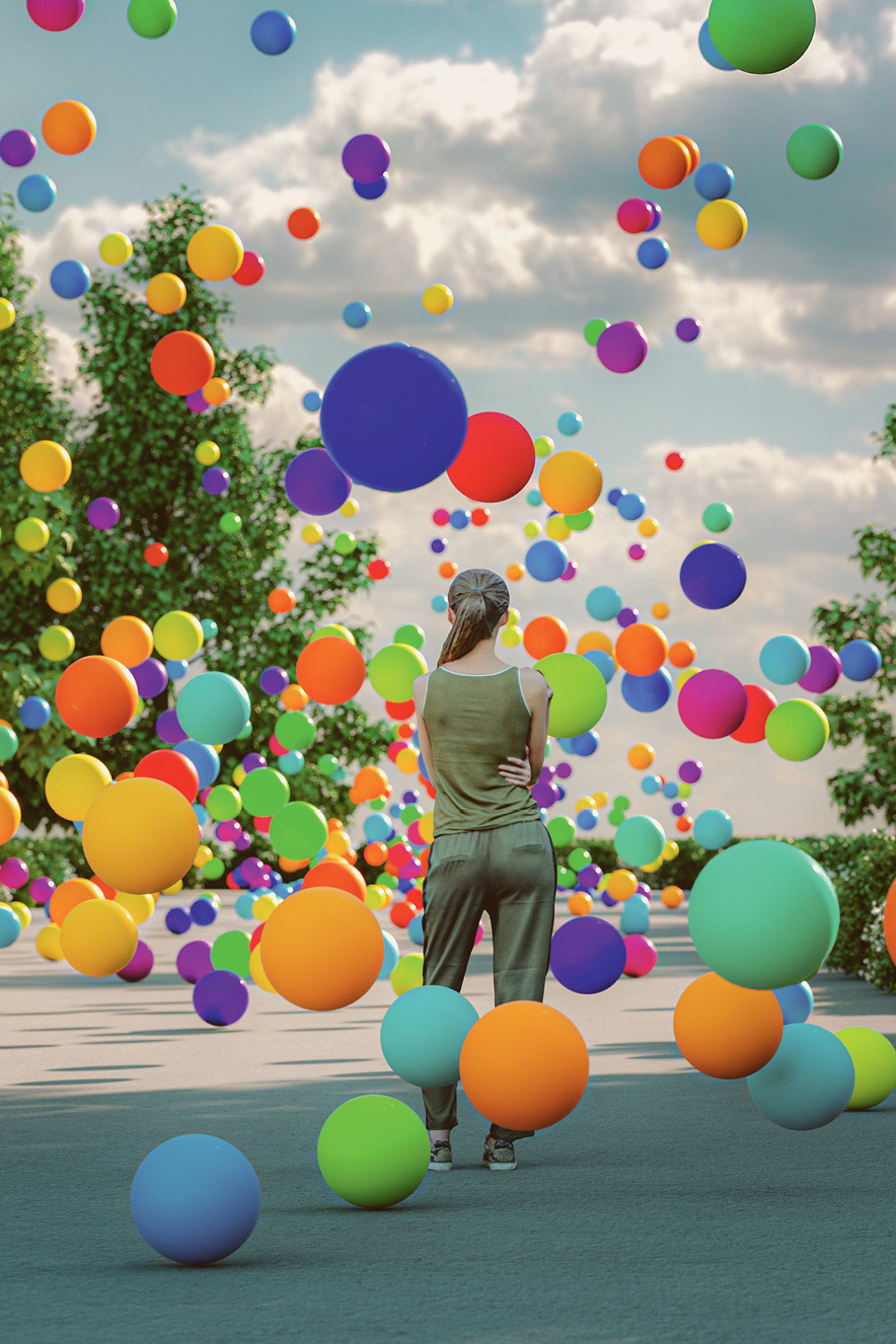 mulher olha para o horizonte cercada de bolas coloridas
