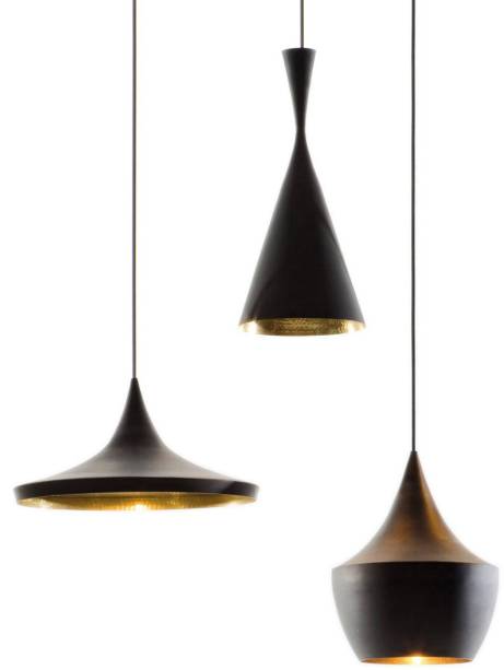 Pendente Trio Preto com Dourado por Tom Dixon, R$ 499, <a href="https://www.americanas.com.br/produto/18548911/tom-dixon-trio-preto-com-dourado-inclui-3-pendentes-neste-anuncio-conforme-imagem">Americanas</a>