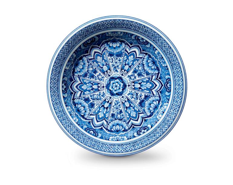 O tapete Delft Blue (2,50 m de diâmetro) é resultado da parceria entre o designer Marcel Wanders e a Moooi Carpets. De lã, sai por 2.499 euros.