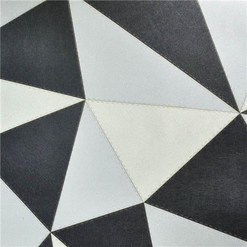 O papel de parede vinílico geométrico <a href="https://www.gotoshop.com.br/decoracao/papeldeparede/papel-de-parede-vinilico-geometrico-preto-e-branco-11979472.html?utm_source=sites&utm_medium=matéria_CC&utm_campaign=produtos&utm_content=201801">Preto e Branco</a> custa R$ 195,35.