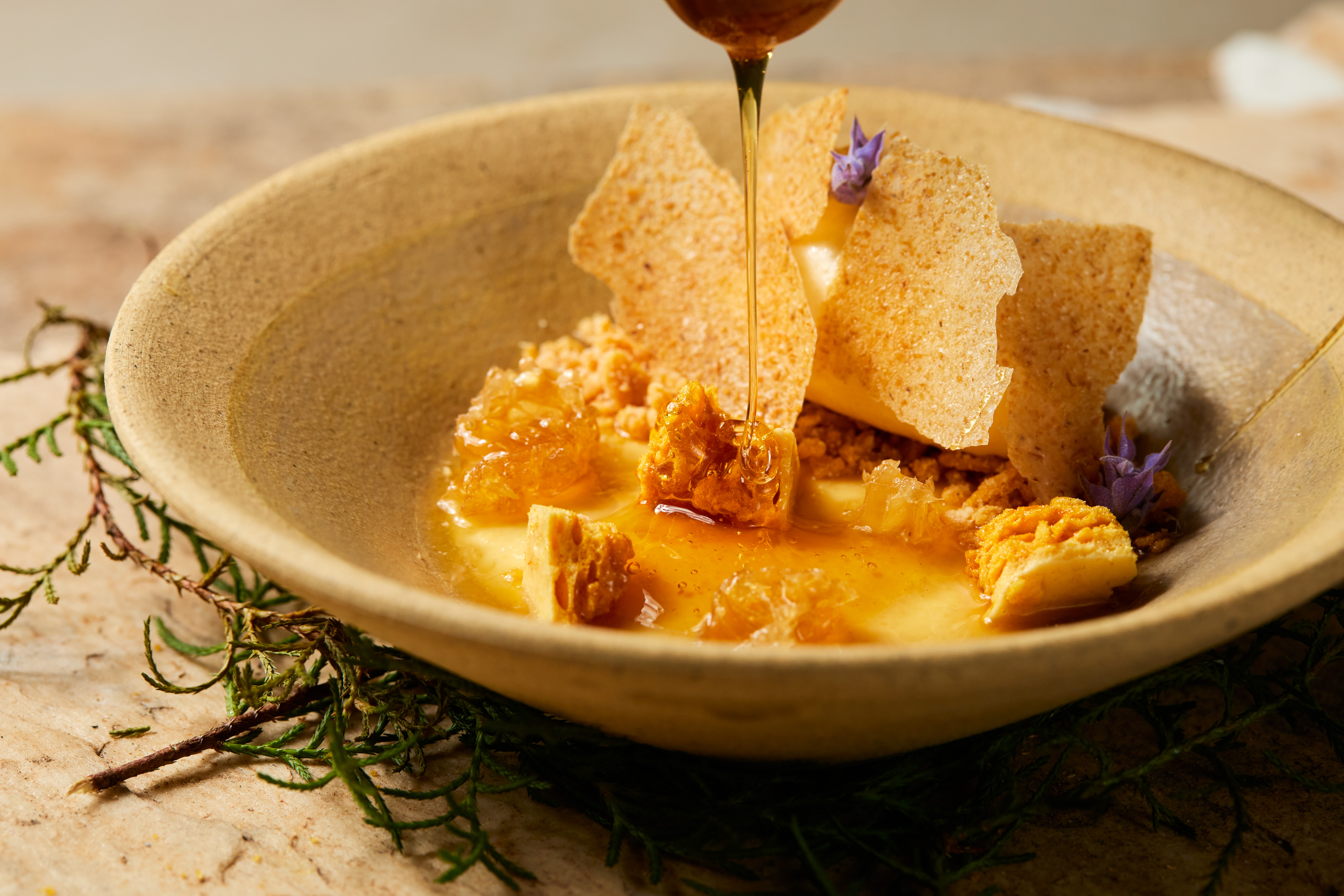 Sobremesa com milho, mel e leite, do menu do Puriman