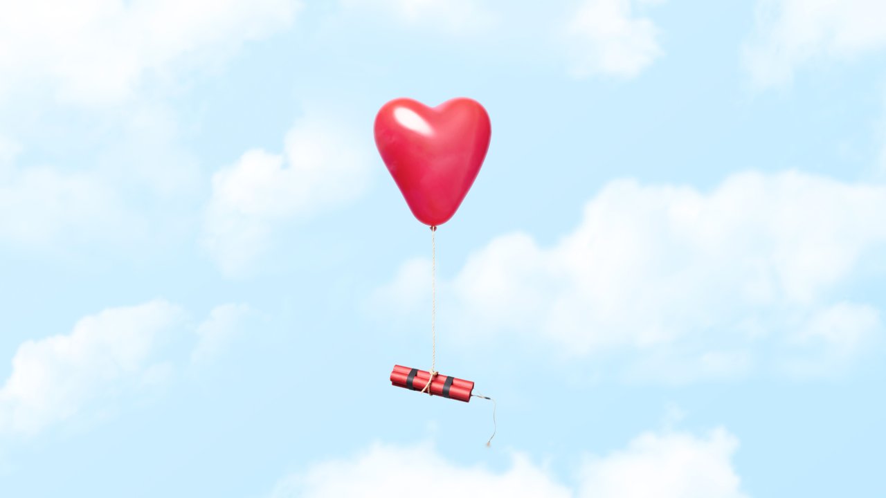 Conceptual photograph of a heart shaped red balloon tied to a dynamite bundle floating in the clouds, could illustrate concepts related to bad love relationships and similar. Could also illustrate the opposite of being newly in love were everything is exciting and a little dangerous in a good way or even just the thrill