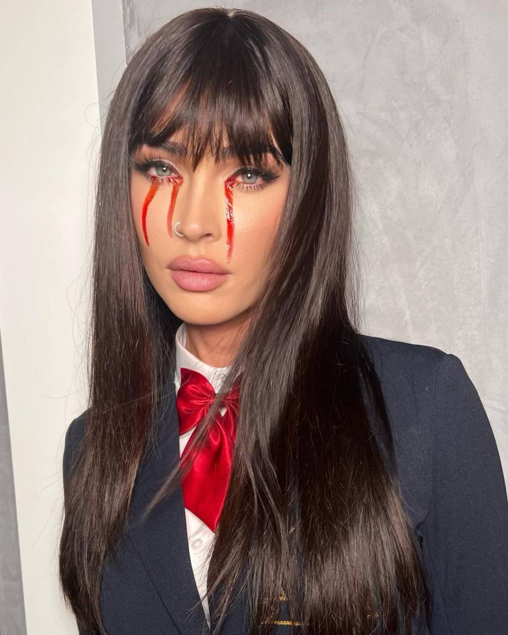 megan-fox-halloween-2023 Fantasias de Halloween dos famosos em 2023.