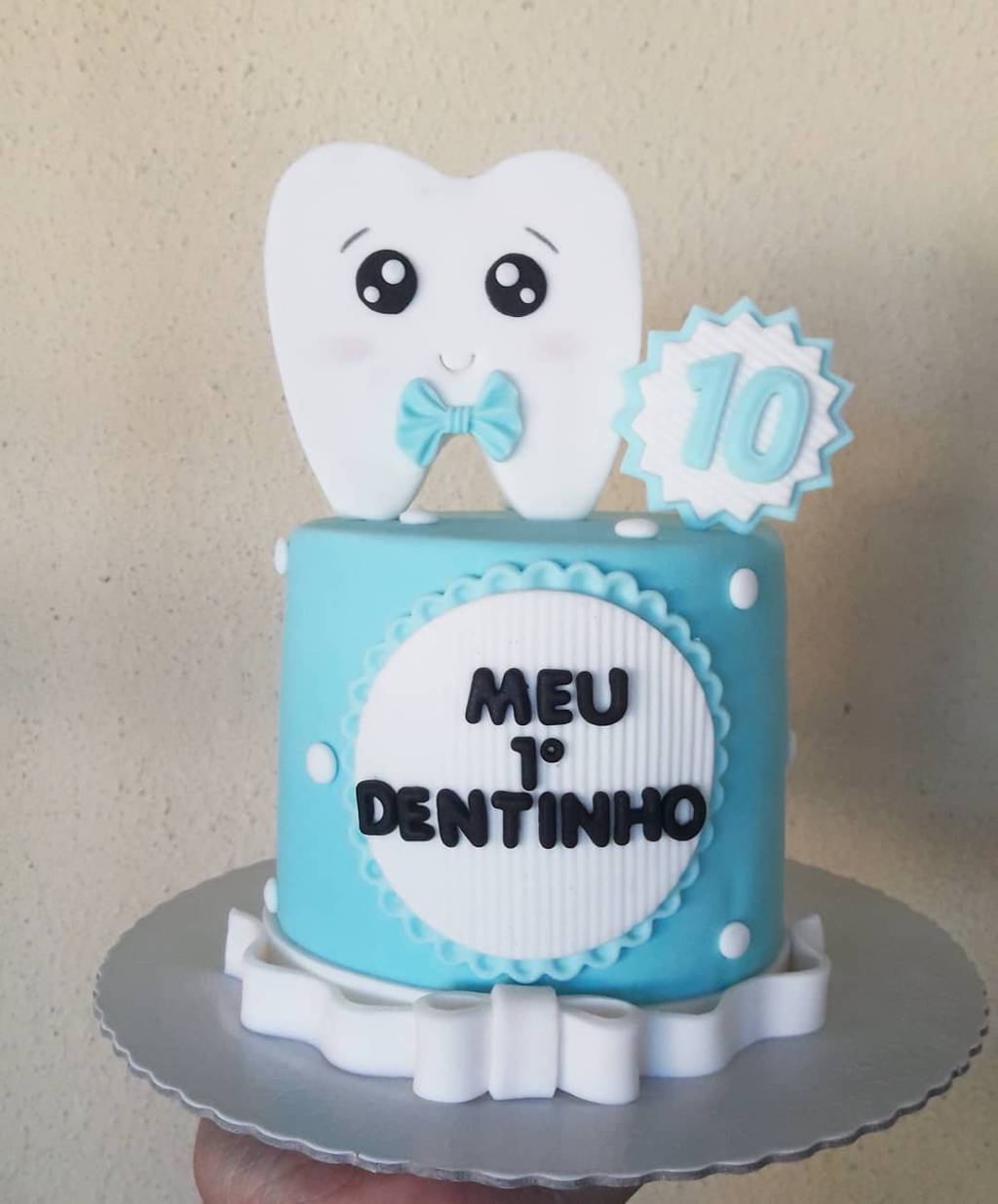 Bolo festa primeiro dente azul Bolo de festa do primeiro dente em azul