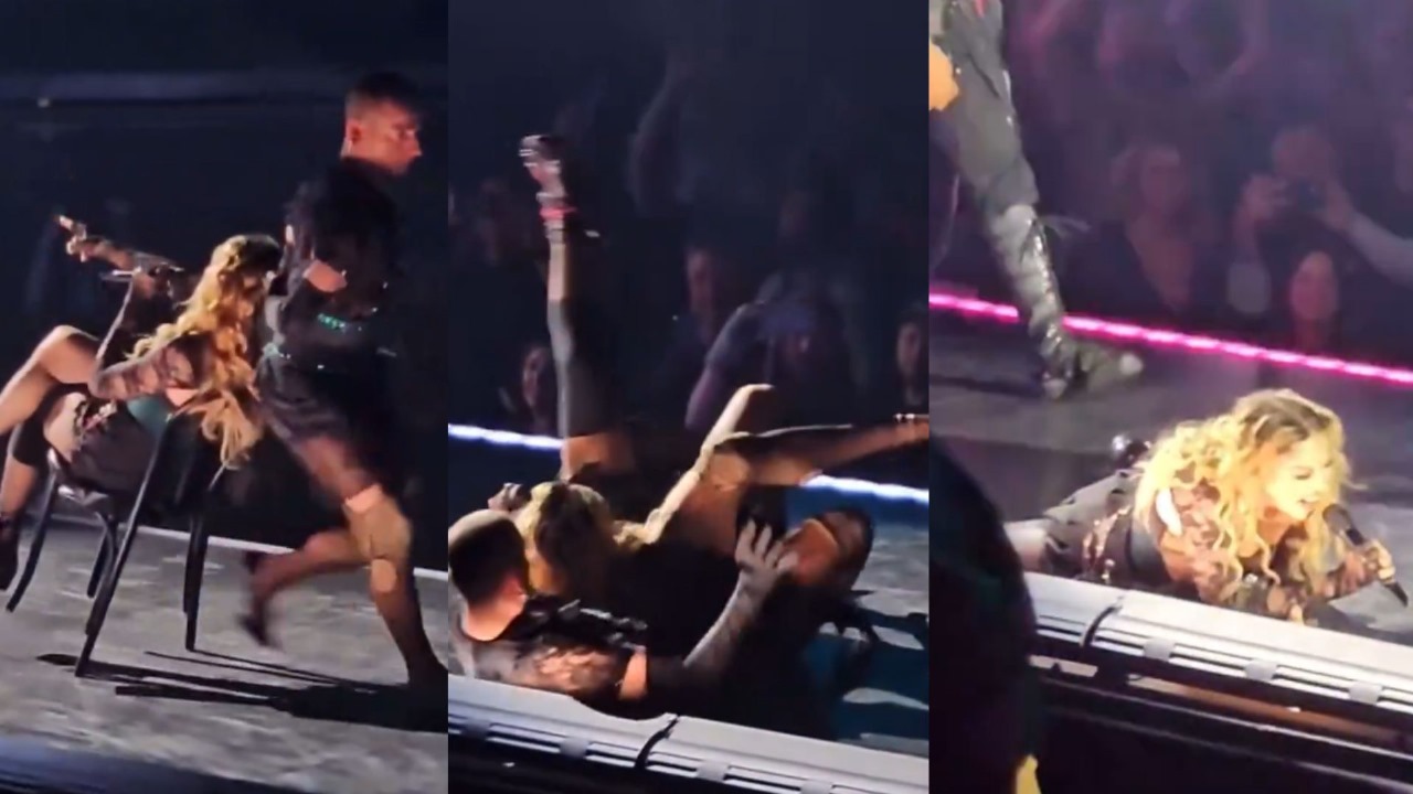 Madonna caindo em palco durante a The Celebration Tour