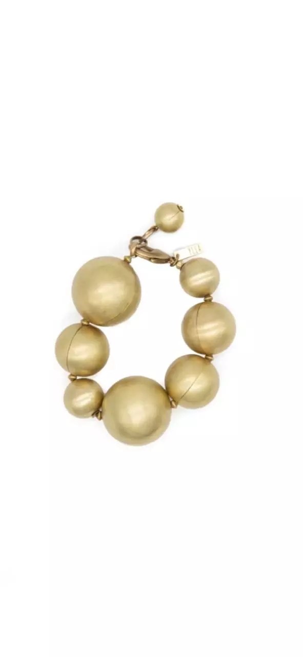 pulseira dourada com bolas