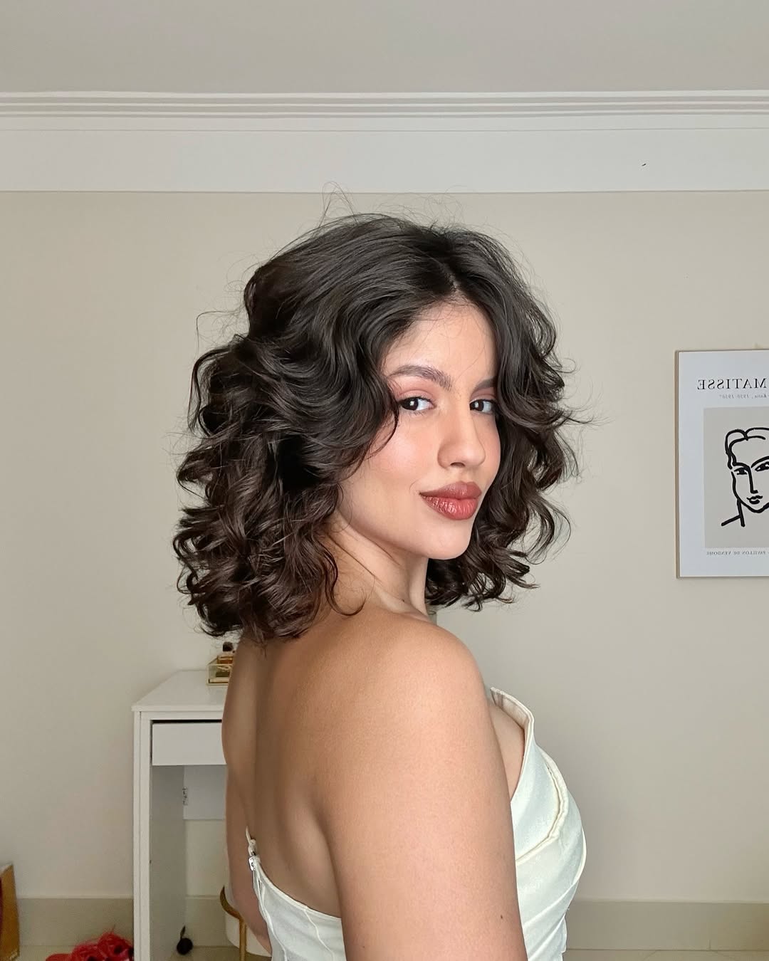 Cabelo ondulado com corte bob longo