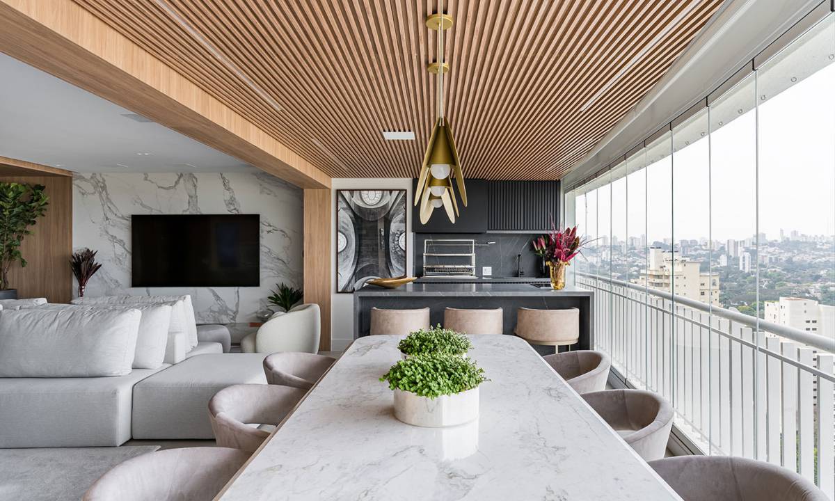 Sala e área gourmet integradas permitem assistir à TV de qualquer ponto | Projeto do escritório Spaço Interior