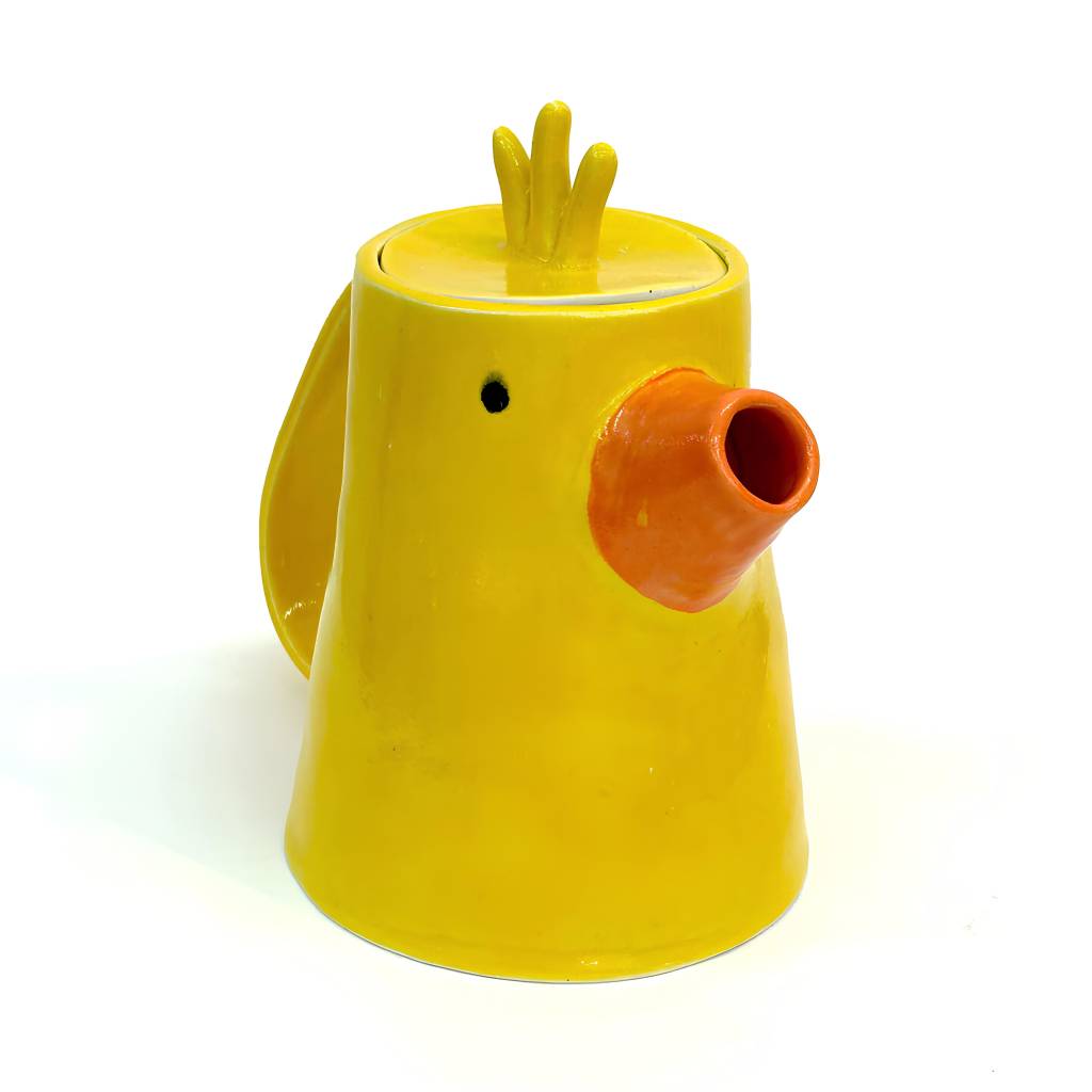 Bule amarelo em formato de pato