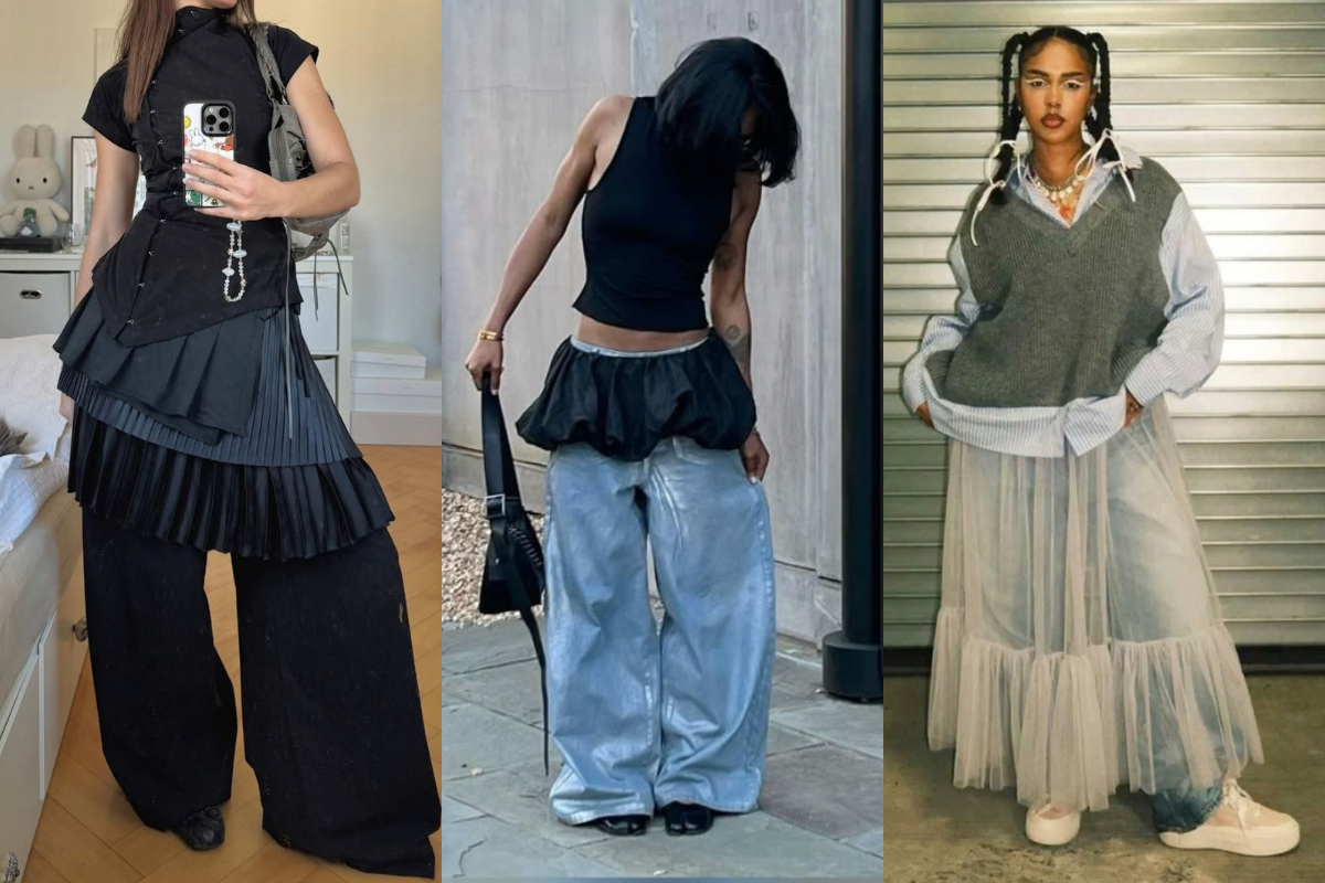 Três mulheres exibem looks de moda com sobreposições e volumes. A primeira veste blusa preta, saia plissada em camadas e calça larga. A segunda usa top preto, saia bufante e calça jeans folgada. A terceira combina camisa listrada, colete de tricô, calça jeans e saia de tule transparente. Todas com maquiagem e acessórios marcantes