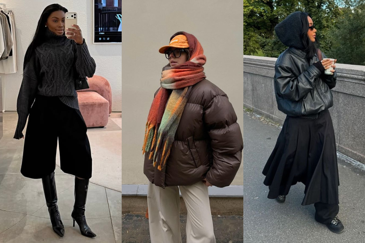 Três mulheres exibem looks de inverno. À esquerda, uma mulher sorri para a câmera, vestindo suéter cinza de gola alta, calça culotte preta e botas de salto. Ao centro, uma mulher de óculos e boné laranja, com cachecol colorido, jaqueta puffer marrom e calça bege. À direita, uma mulher de óculos escuros, jaqueta de couro preta, capuz e saia longa preta, segurando um copo branco